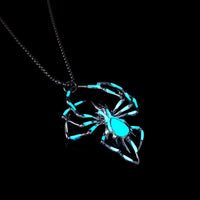 The Widow's Web Necklace glowing in the dark